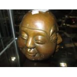 Chinese four faces bronzed metal paperweight