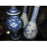Pair of antique Chinese blue and white vases with character mark underneath (chip to base) & Kang