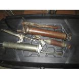 Box of car / workshop related items : grease guns, oil cans,