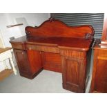 Late 19th century carved mahogany sideboard