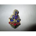 Vintage South East Asian brooch modelled as Buddha set with coloured glass