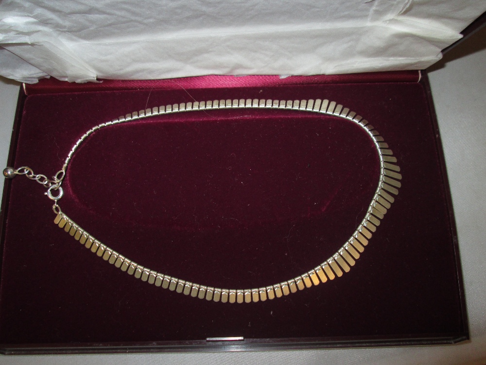 Modern continental silver necklace in presentation box