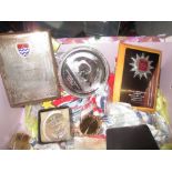 Box of various swimming medals from the 1990s awarded to Lindsay Powell