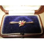 9 ct gold bar brooch set with seed pearls and ruby modelled as an insect