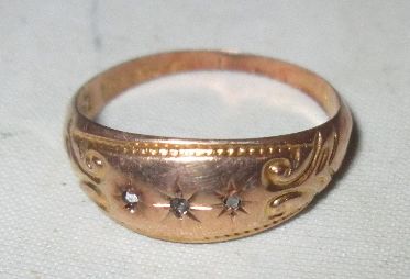 9 ct gold gypsy ring set with three diamonds size 52 0.