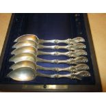 Set of six 19th century French silver grapefruit spoons in mahogany presentation box by Philippe
