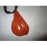 Lump of polished amber mounted as a pendant 19 g