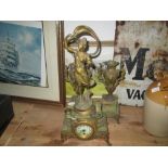 Early 20th century French spelter mantle clock with garniture vases