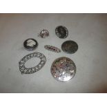 Assorted silver brooches