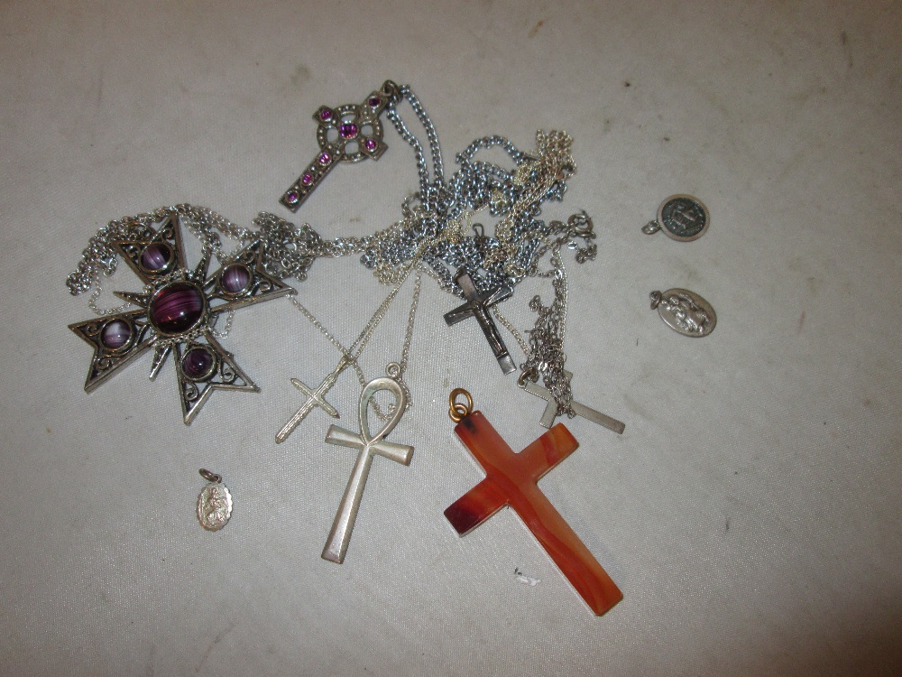 Various silver and other metal St Christophers & crucifixes