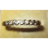 Unmarked but tested, 9 ct gold ring set with seven diamonds size 60,1.