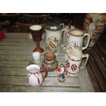19th century pewter lidded jugs,