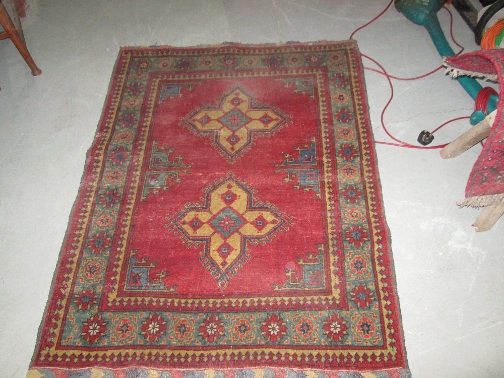 Mid 20th century red ground wool rug