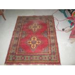 Mid 20th century red ground wool rug