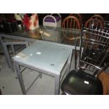 Modern glass top dining table and four sidechairs & two occasional tables