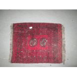 Mid 20th century ruby ground wool rug