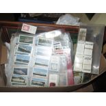 An untidy array of cigarette & non tobacco trade cards offered as glazed displays & further related
