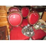 Set of four Victorian mahogany hoop back and leather dining chairs