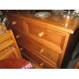 Modern pine chest of five drawers