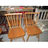 Set of four stick back Ercol dining chairs