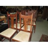 Set of eight Scottish School Arts & Crafts oak dining chairs with drop in seats