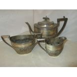 Solid silver Neo Classical three part tea set, comprising of sugar bowl,