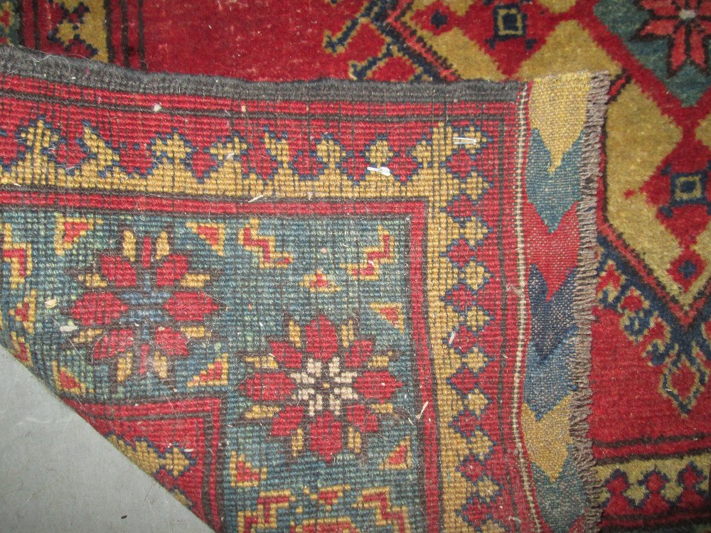 Mid 20th century red ground wool rug - Image 2 of 2