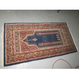 Mid 20th century wool prayer rug with blue borders