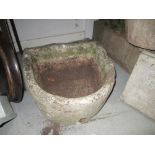 Antique stone planter and terracotta flower pot