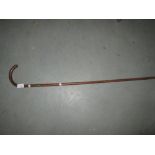 Silver bound walking stick