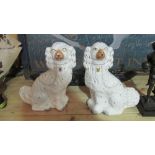 Pair of 19th century Staffordshire pottery dog ornaments