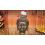 Bronzed metal Buddha head
