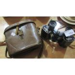 Vintage Dolland binoculars in leather case