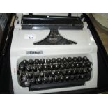 Vintage Erika typewriter in case