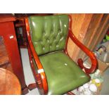 Green leather upholstered button back revolving office chair