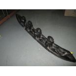 Carved African hardwood Men in Canoe ornament (tribal interest)