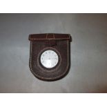 Rare and unusual early 20th century leather saddle / pannier clip on pouch holding a plated pocket