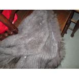 Bag of rabbit fur gilet & hats etc.