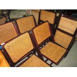 Set of six cane seated folding chairs