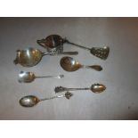 Solid silver tea strainer, souvenir spoon and mustard spoon 57 g, plated mustard pot,