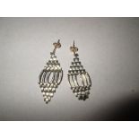 Pair of modern 9 ct gold drop earrings 2.