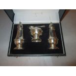 Solid silver cruet set including salt & pepper pot and mustard with blue glass liner & spoon