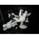 4 x novelty metal Michelin Men ornaments