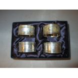 Set of four silver serviette rings in presentation box Birm 2001 Victoria Silverware 100 g