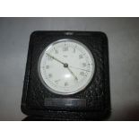 Vintage travelling Imhof clock in leather case