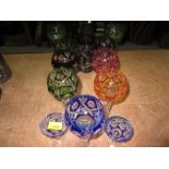 Decorative coloured Bohemian glass decanter and wine glasses