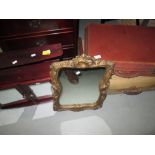 Mirror, bathroom cabinet, vintage suitcases,