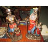 Pair of resin figures of Africans