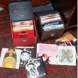 Two carry cases of 7 inch singles, mostly 70/80s including Rod Stewart, Erasure, The Undertones,