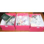 Three boxes of dolls house furniture and ornaments.